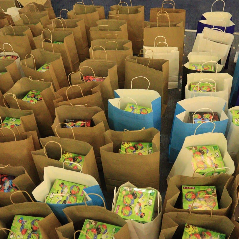 Rows of gift bags prepared for the children